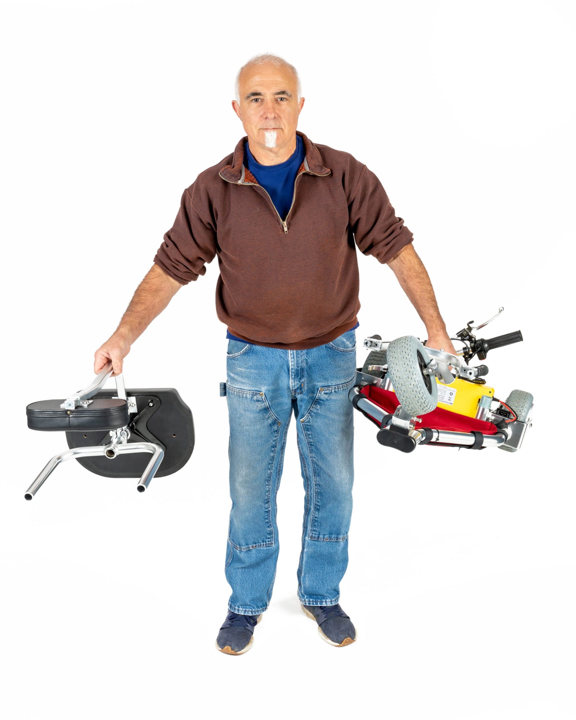 TravelScoot Escape Ultralight Travel Scooter being carried