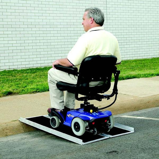 Man using a mobility scooter with Pride Single Fold Ramp