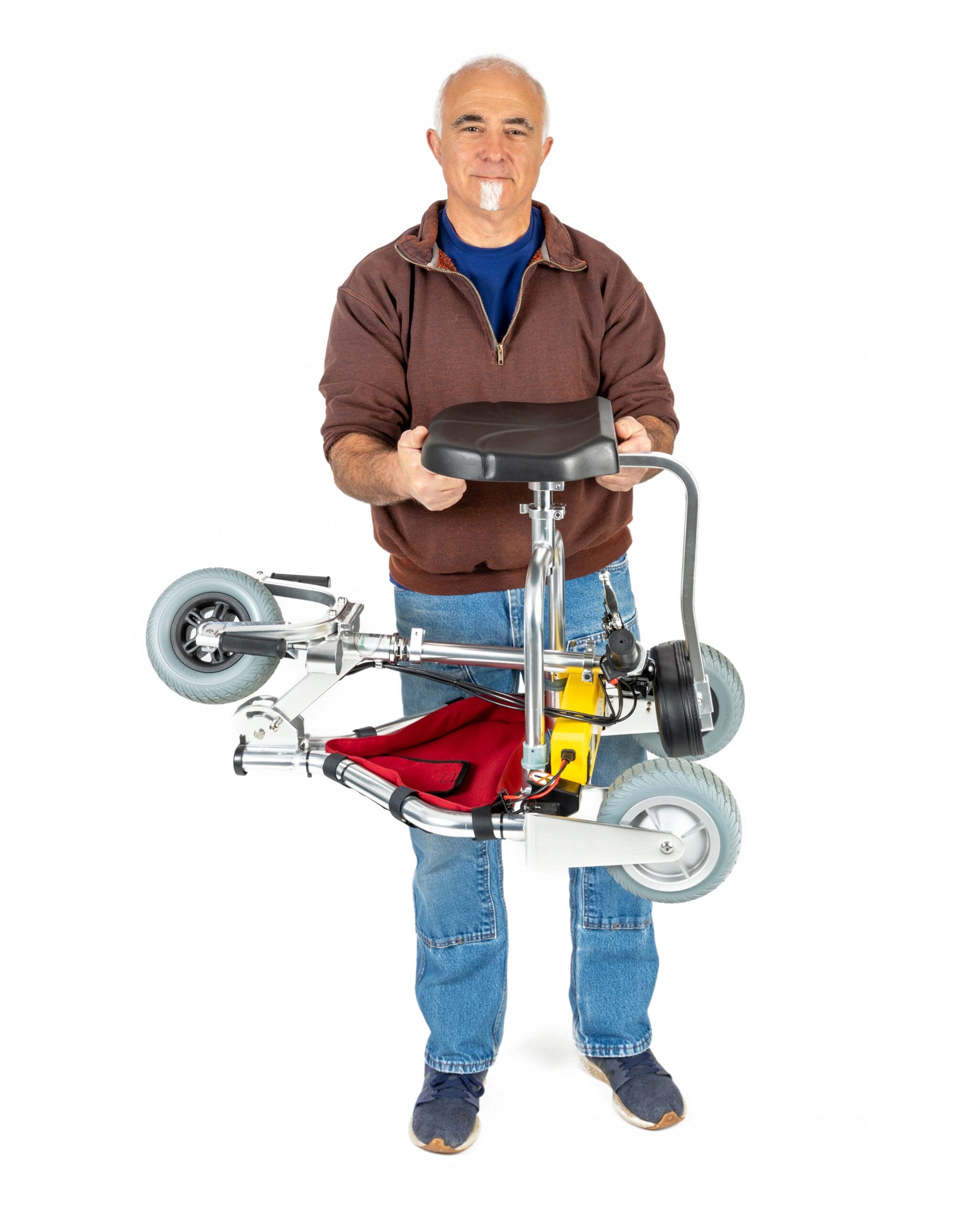 TravelScoot Escape Ultralight Travel Scooter being carried