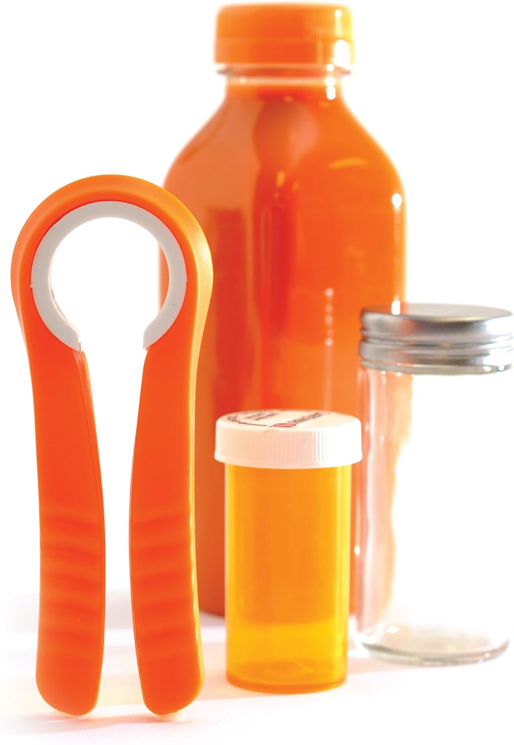 Orange bottle, pill container, and opener on a white background