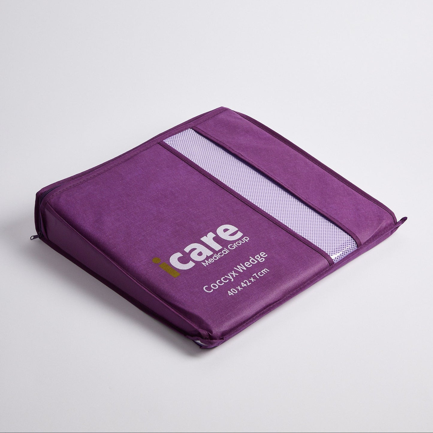 A purple icare Coccyx Wedge with a white reflective stripe and white printed branding, shown on a light gray background.