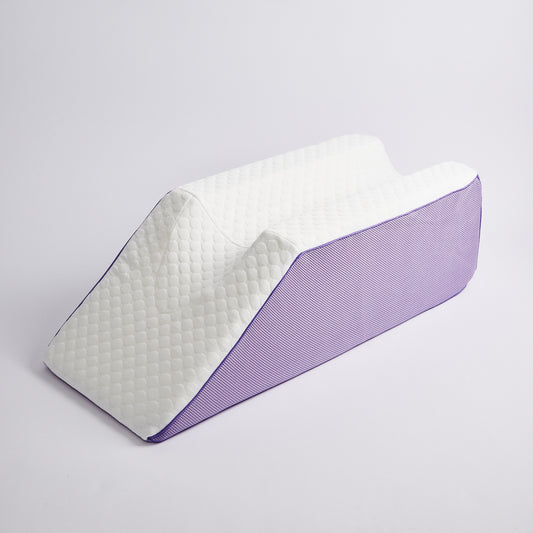 icare Leg Raiser with purple and white design on a light gray background