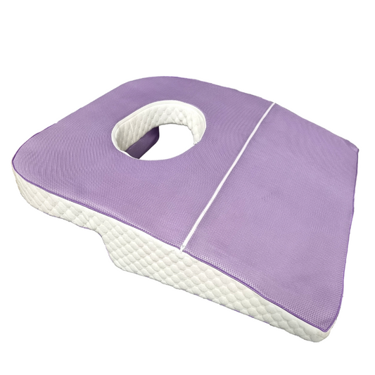 Purple and white icare Supporta Rotator Cuff Recovery Pillow with a hole in the center on a white background
