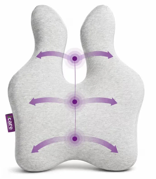 A light gray icare Reform Full Back Support cushion with purple arrows and dots indicating support zones, shown on a white background. A small purple fabric tag on the left edge reads 'icare'.