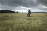 byACRE Carbon Overland Walker sitting in field