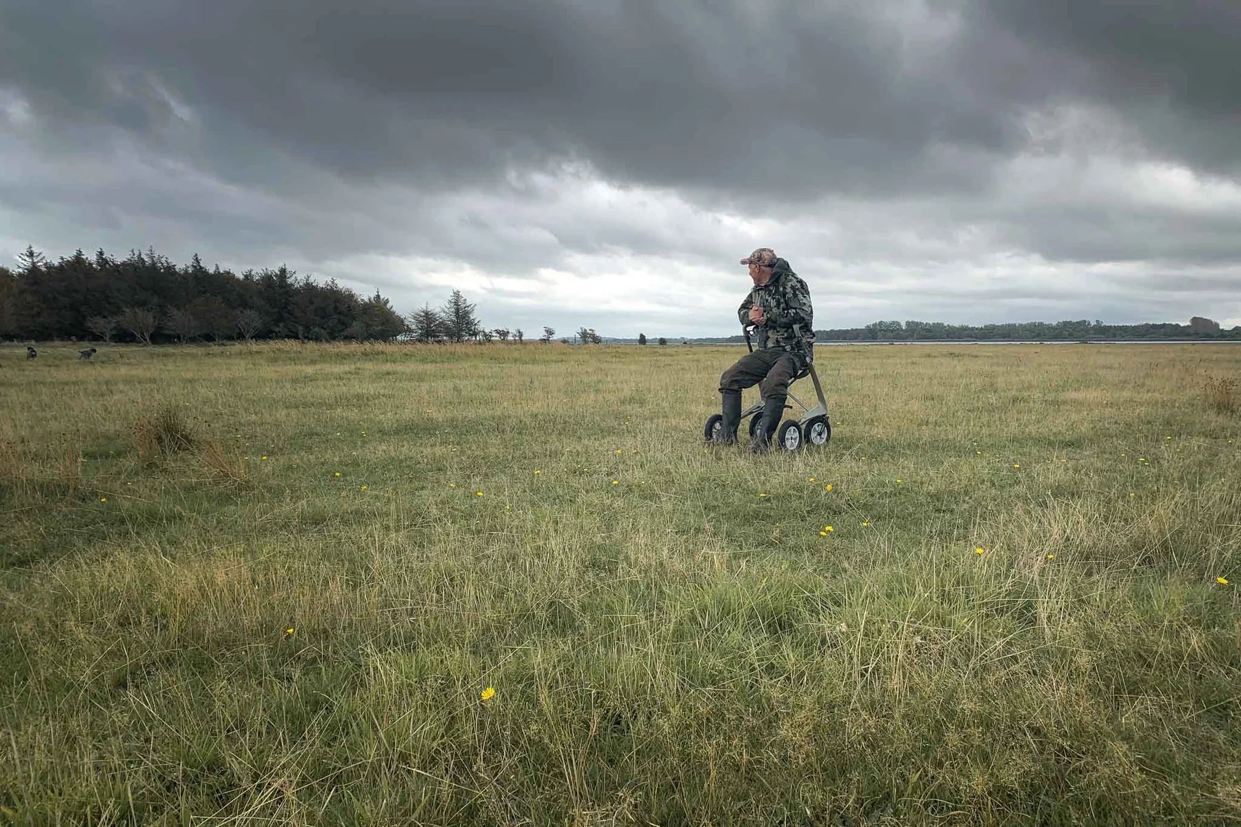 byACRE Carbon Overland Walker sitting in field