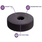 A charcoal icare Supporta Donut Cushion, shown on a white background with purple callout lines and icons highlighting features: ActiveXT™ Core, Breathable Mesh Cover, and Open-Centre Design.