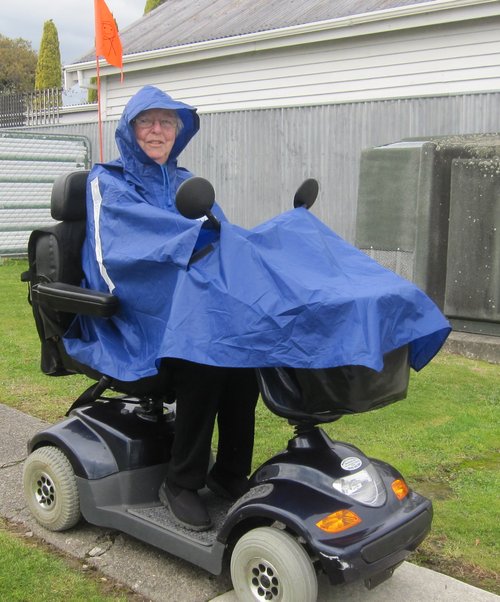 Wet Weather Poncho with rider on scooter