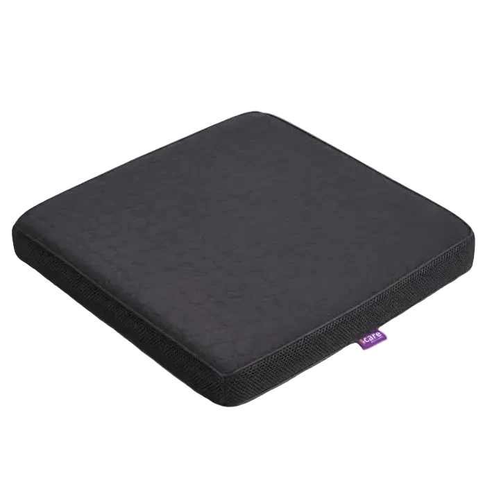 A charcoal icare Supporta ThermoPad Seat cushion or seat pad with a small purple tag on the side, photographed on a clean light gray background.