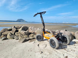 Veehop Electric ATV orange on beach rear