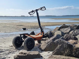 Veehop Electric ATV orange on beach
