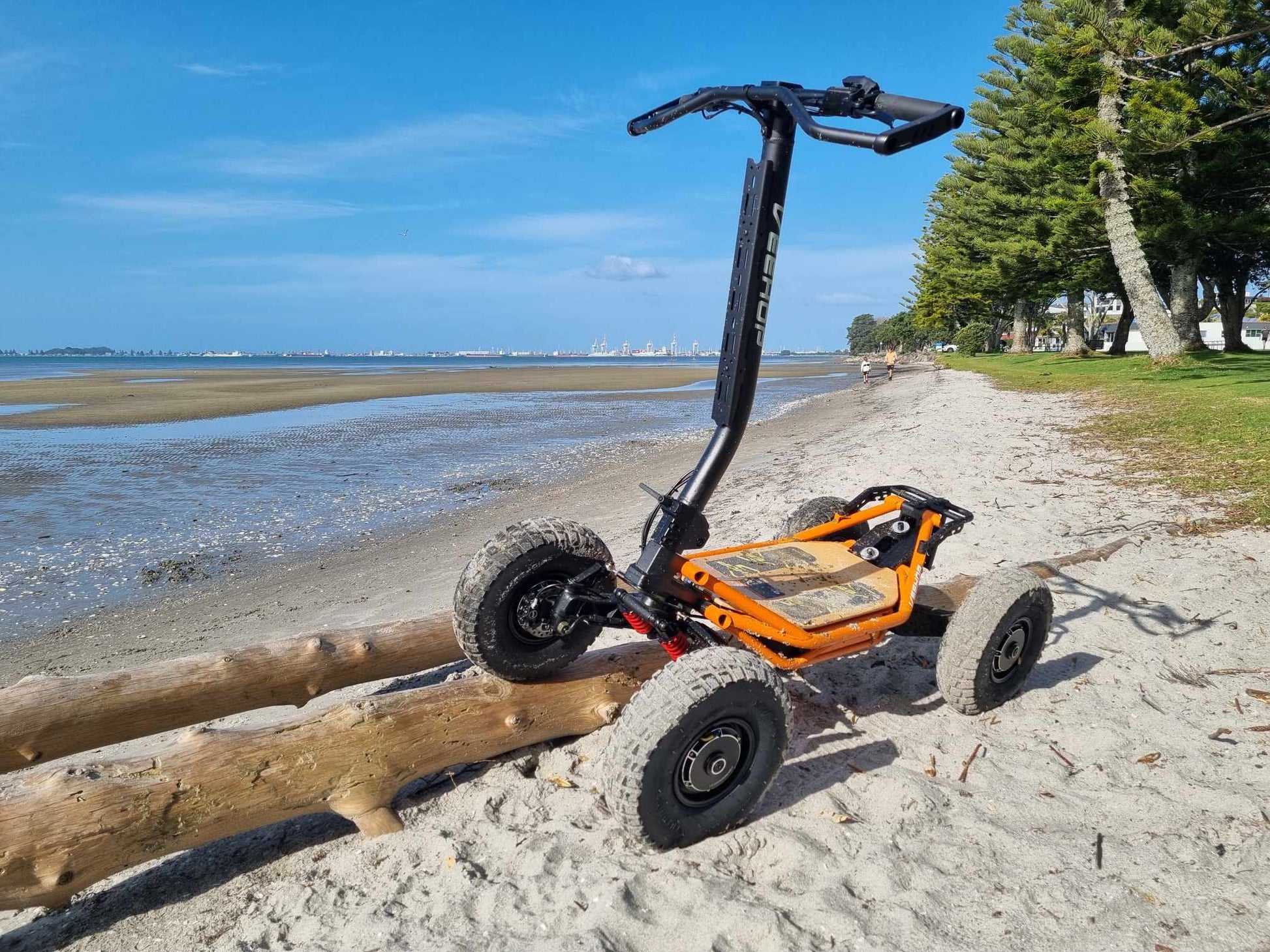 Veehop Electric ATV orange on beach