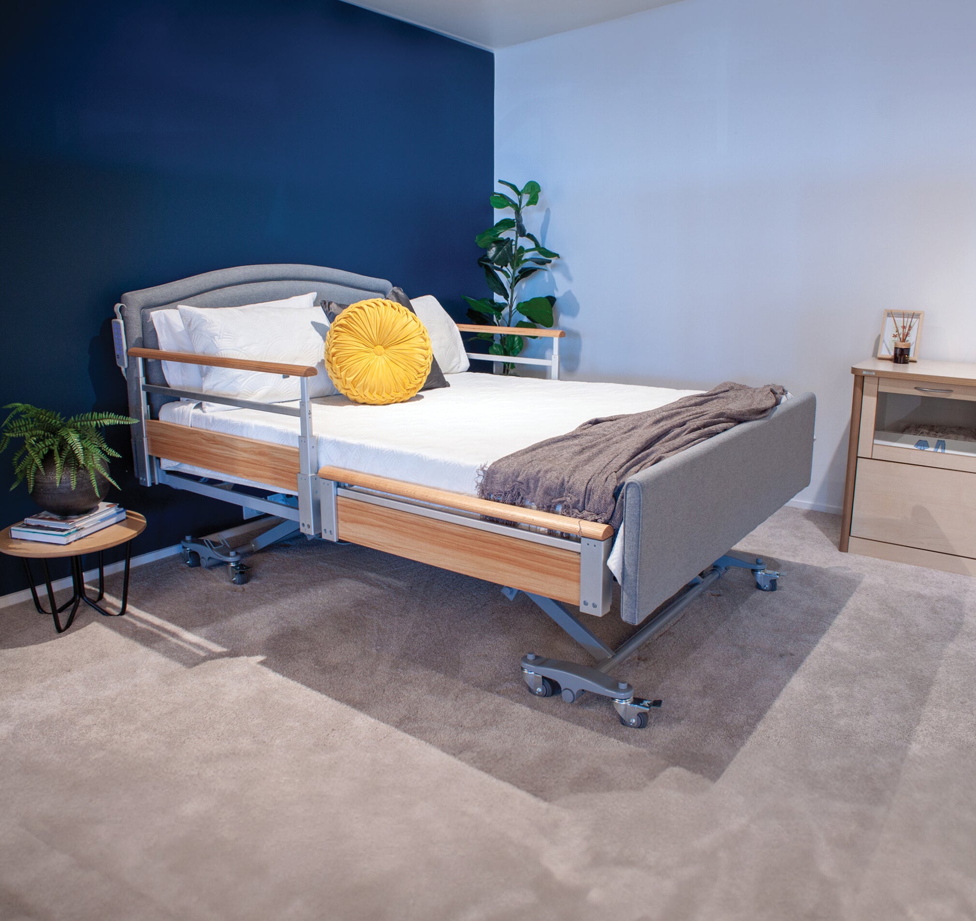 Casero Quad Telescopic Split Side Rails lowered on bed