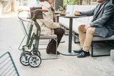 Uplivin Trive Walker Rollator folded at cafe