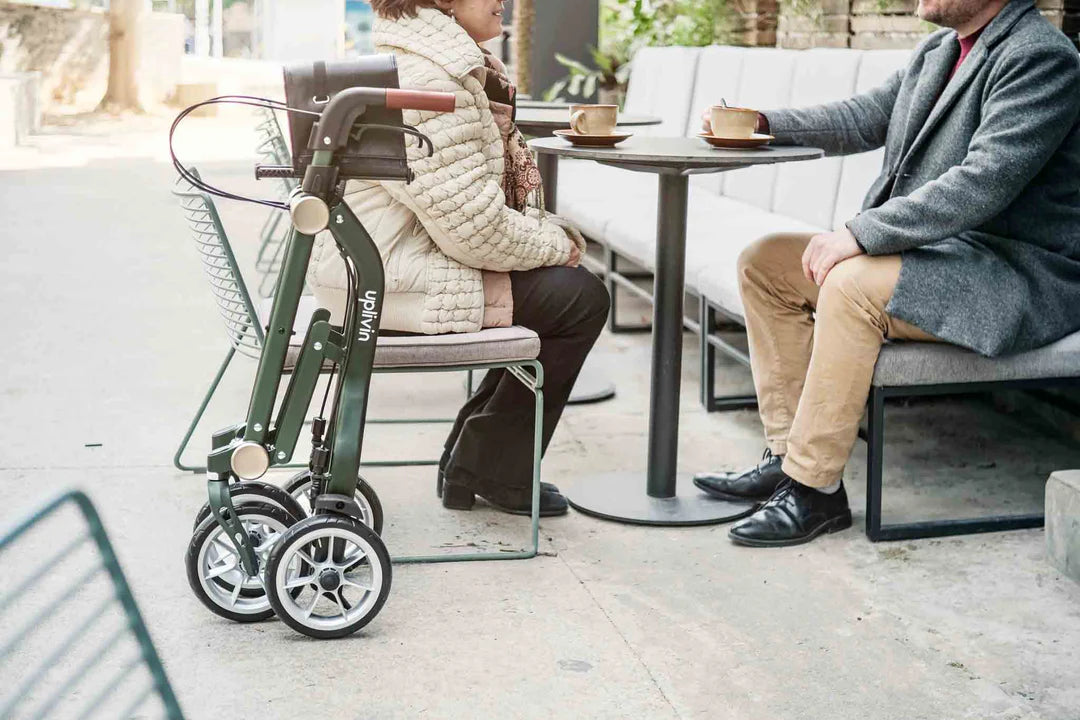 Uplivin Trive Walker Rollator folded at cafe