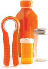 Orange bottle, pill container, and opener on a white background