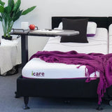 icare Over Bed Table in bedroom setting over icare ced
