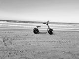 Kaaspeed K1S Fat Tyre Self Balancing E Scooter black and white image on beach