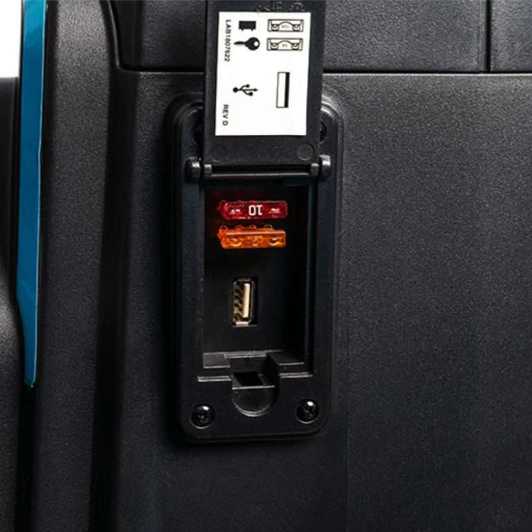 Close-up of a power outlet and USB ports on a Pride Mobility Celebrity MFP Mobility Scooter