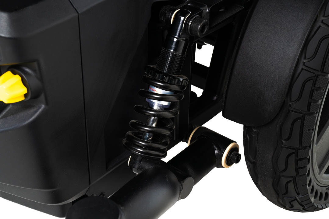 Pride Jazzy EVO 614 HD Active-Trac ATX suspension and drive wheel close-up