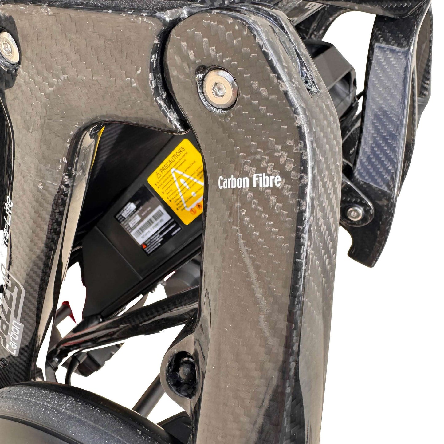 Pride Mobility Jazzy Carbon Ultra Light Powered Wheelchair with 'Carbon Fibre' label on a white background