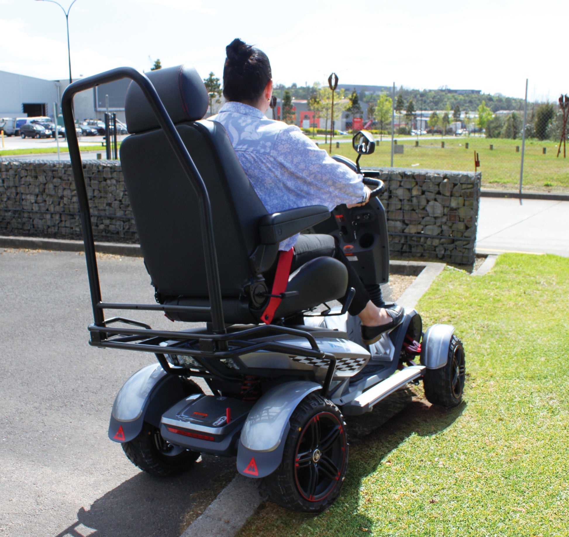Heartway Vita S12X Mobility Scooter outside with rider from the rear