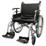 A GF Heavy Duty Self-Propelled Wheelchair with a black fabric seat and backrest, a silver metal frame, and black wheels, shown against a plain white background.