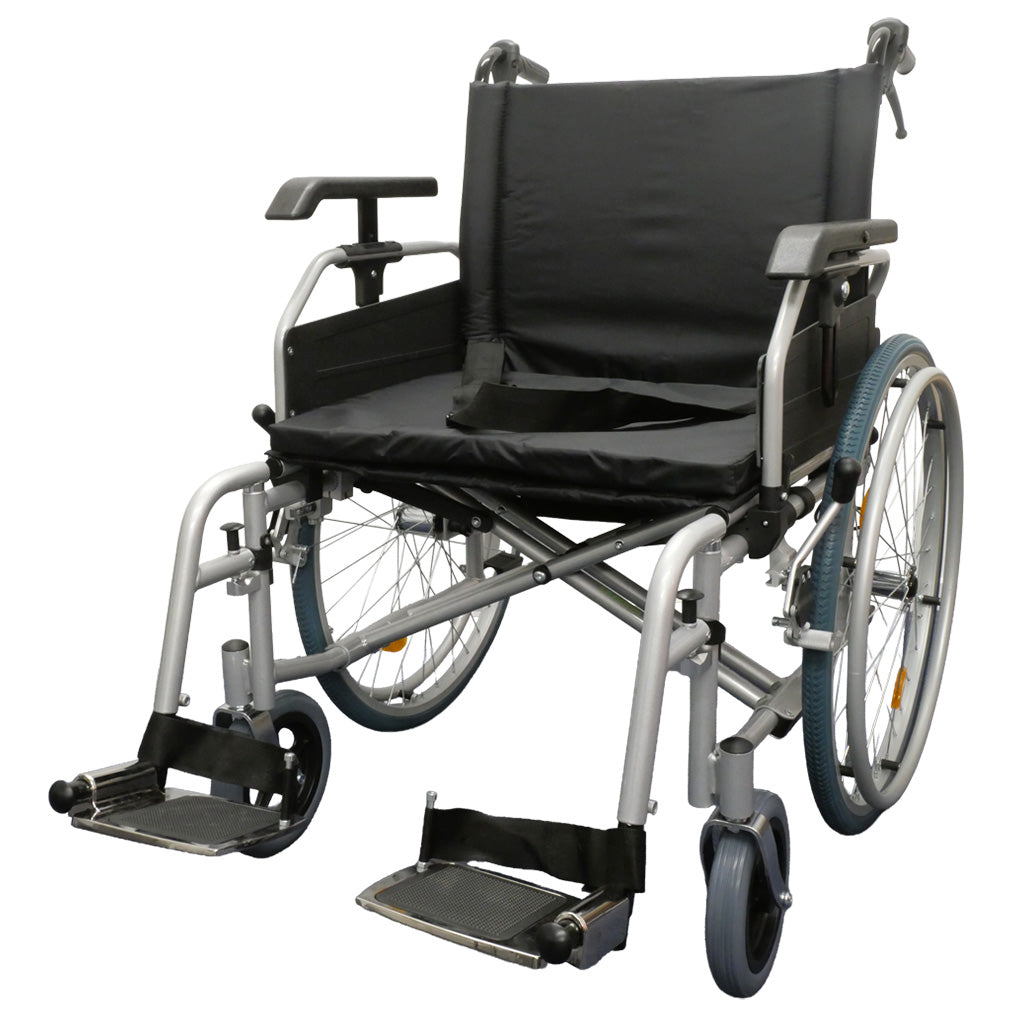 A GF Heavy Duty Self-Propelled Wheelchair with a black fabric seat and backrest, a silver metal frame, and black wheels, shown against a plain white background.