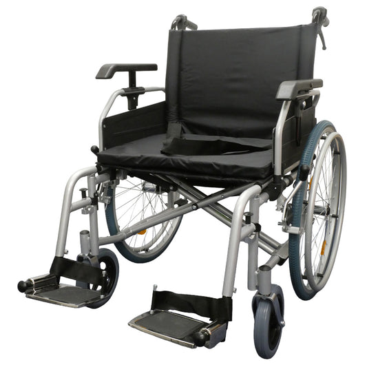 A GF Heavy Duty Self-Propelled Wheelchair with a black fabric seat and backrest, a silver metal frame, and black wheels, shown against a plain white background.