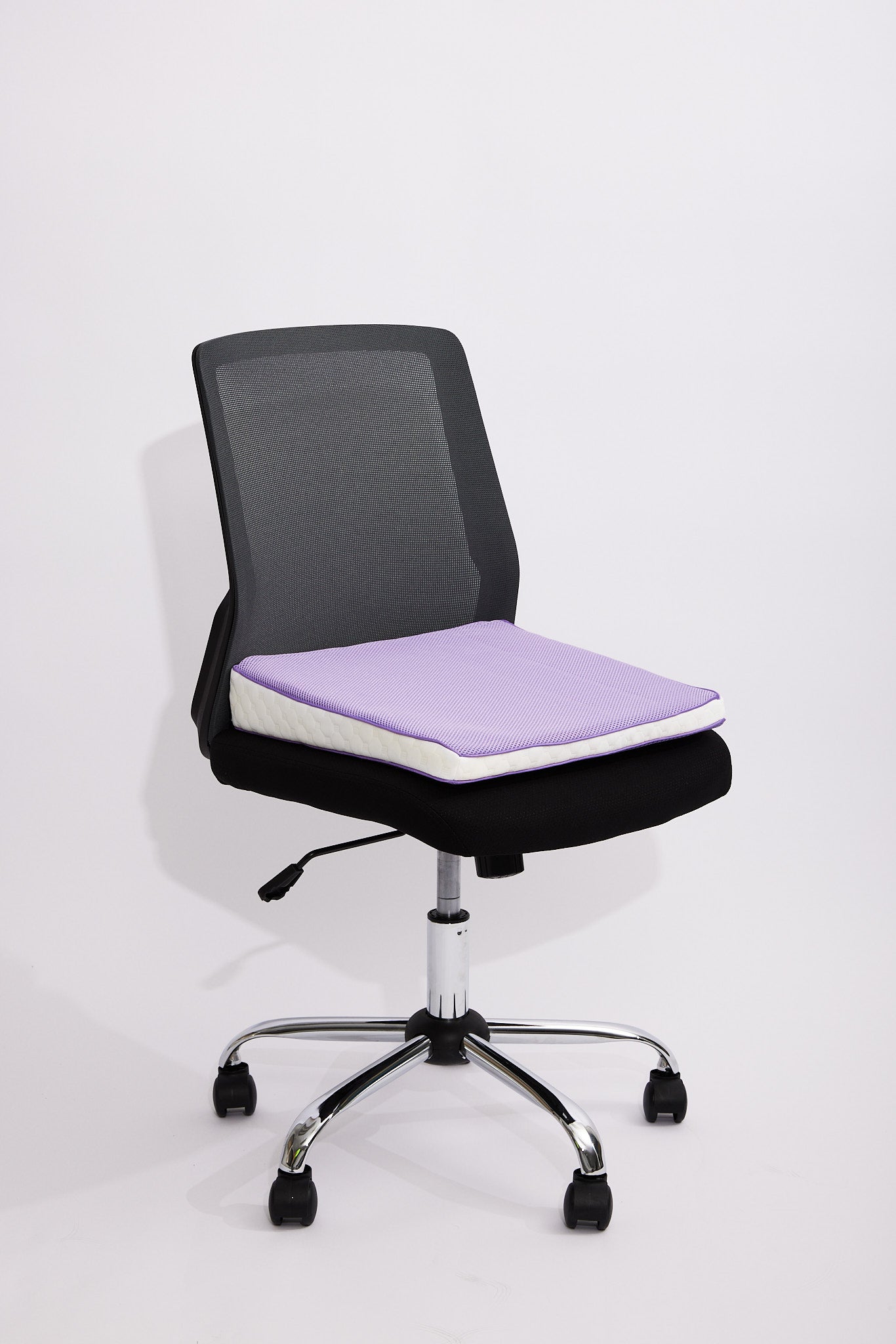 icare Posture Wedge on office seat