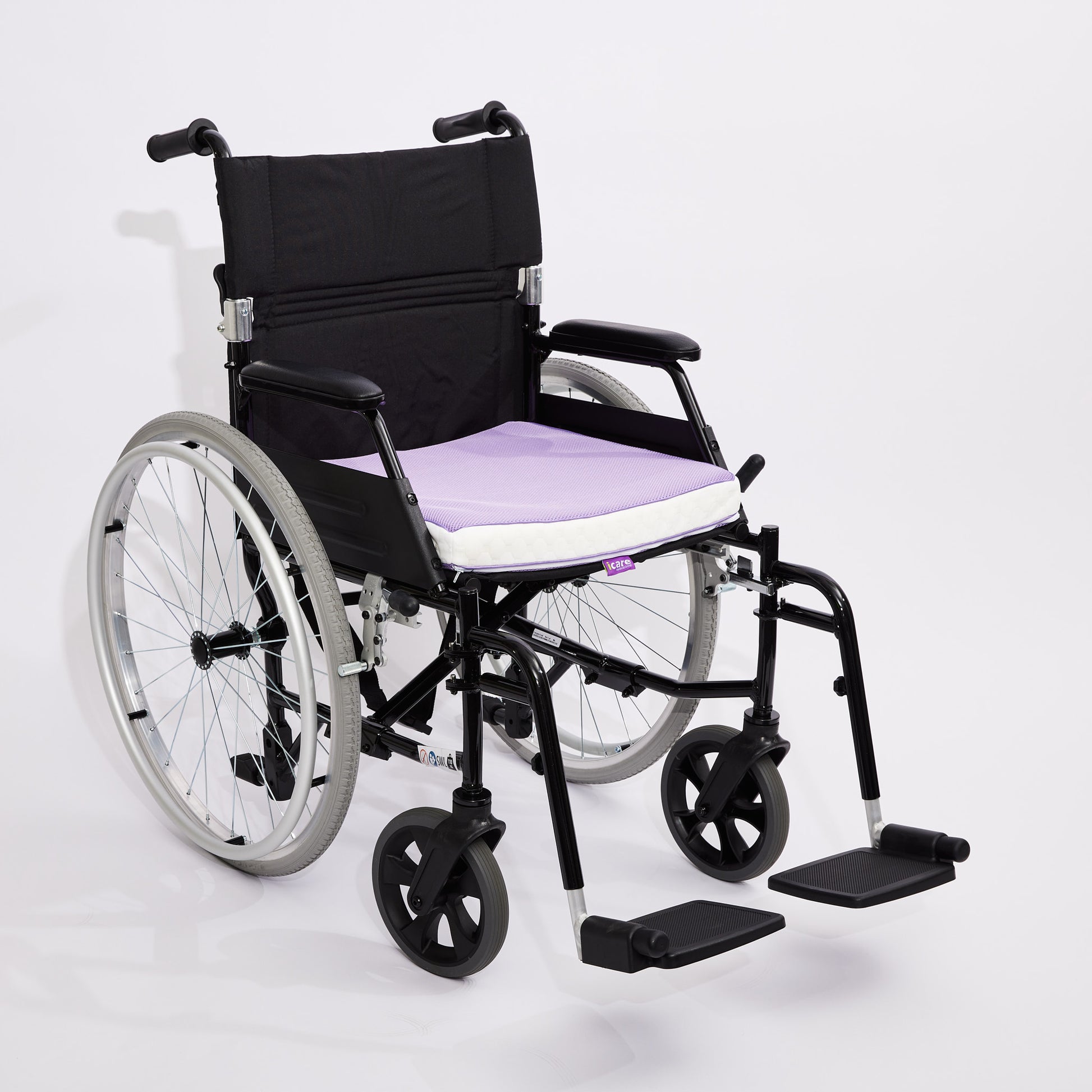 Wheelchair with a purple icare Supporta Seat Cushion on a white background