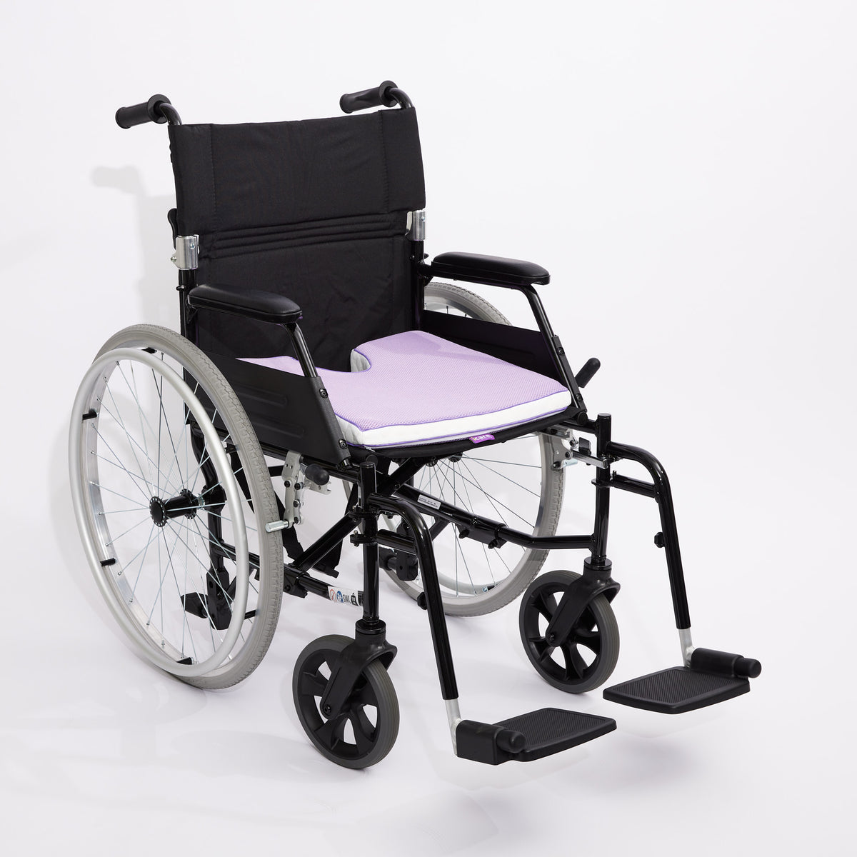 Wheelchair with a purple icare Coccyx Wedge  on a white background