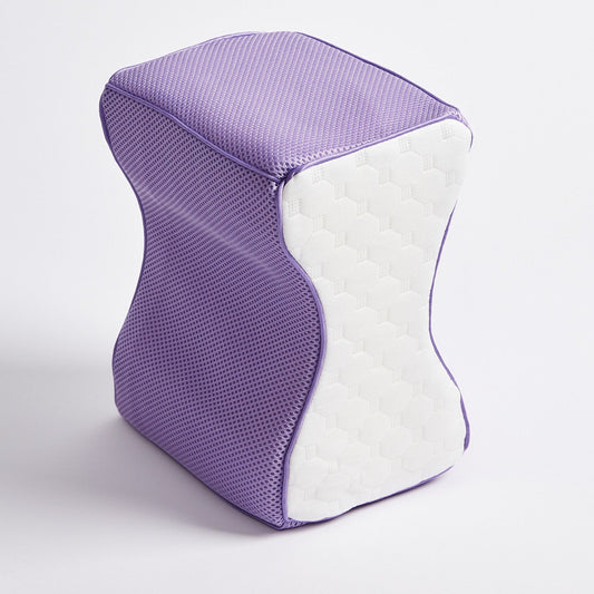 A purple icare Supporta Knee Cushion with a textured mesh fabric on the outer shell and a quilted foam insert, shown on a clean white background.