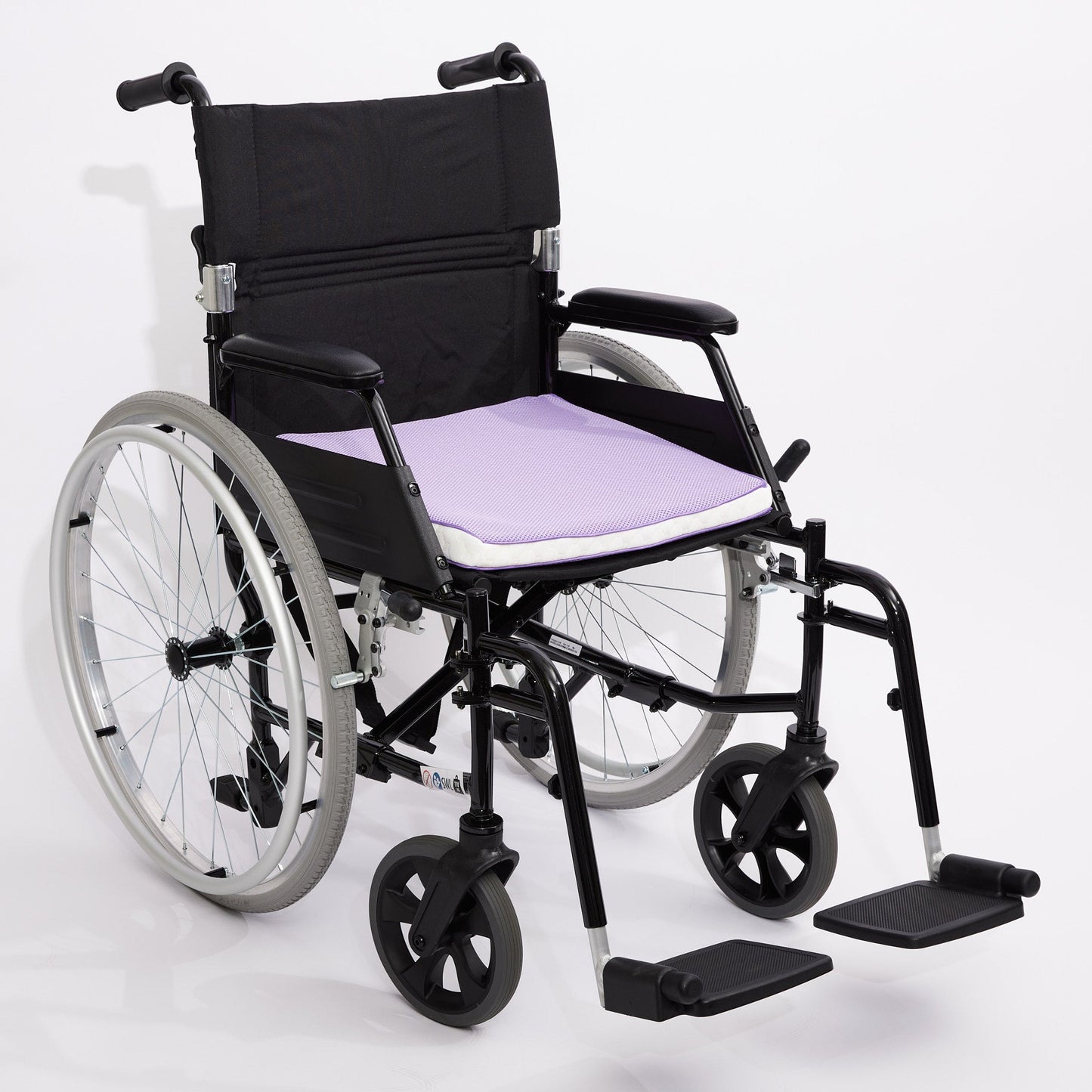 Wheelchair with a purple icare Posture Wedge on a white background