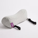 Gray icare Reform Neck Support pillow with a strap on a white background