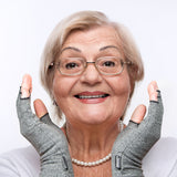 Woman wearing I‑MAK Compression Arthritis Gloves with a white background