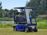Kiwi 900ES Twin Seat Mobility Scooter Blue outdoors in park