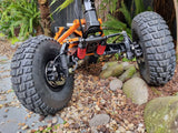 Veehop Electric ATV close up front suspension on rocks