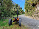Veehop Electric ATV Orange on gravel road