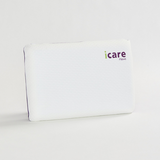 White icare Classic Pillow with 'iCare' branding on a light gray background