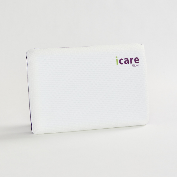 White icare Classic Pillow with 'iCare' branding on a light gray background
