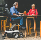 Pride Mobility Jazzy Air 2 Powerchair Elevated at restaurant 