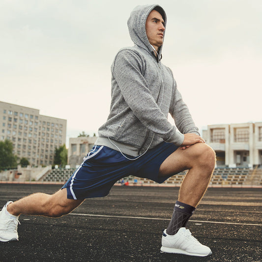 SPARK Kinetic Ankle Sleeve – shown in use