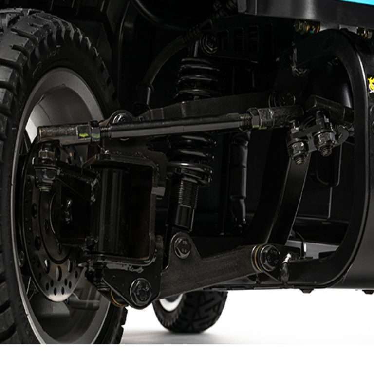 Close-up of a Pride Mobility Celebrity MFP Mobility Scooter suspension system on a white background