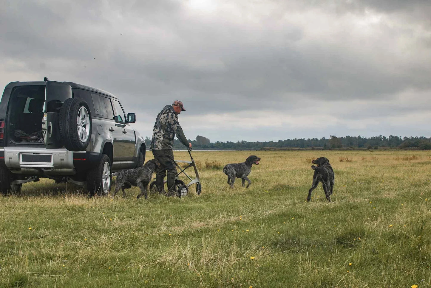 byACRE Carbon Overland Walker outside with hunting with dogs