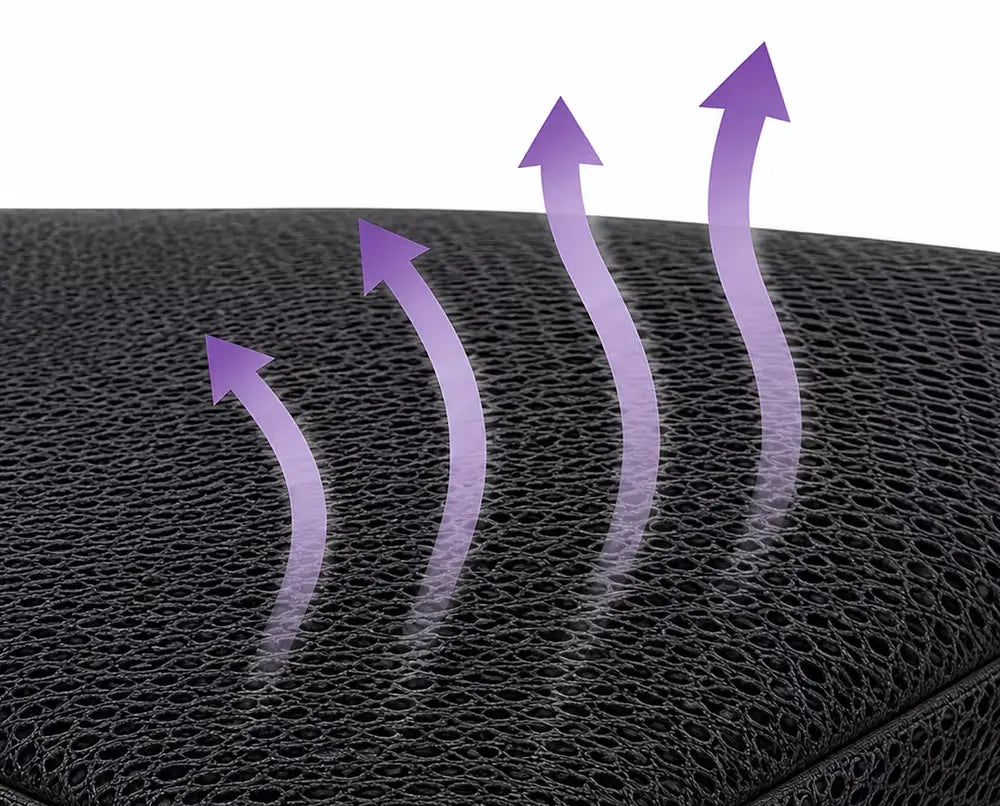 Close-up of a charcoal icare Supporta Bariatric Seat Cushion with three purple airflow arrows rising upward to illustrate breathability.