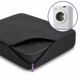 A charcoal icare Supporta Seat Cushion shown on a white background, with a small inset circle containing a white washing machine to suggest washable use.