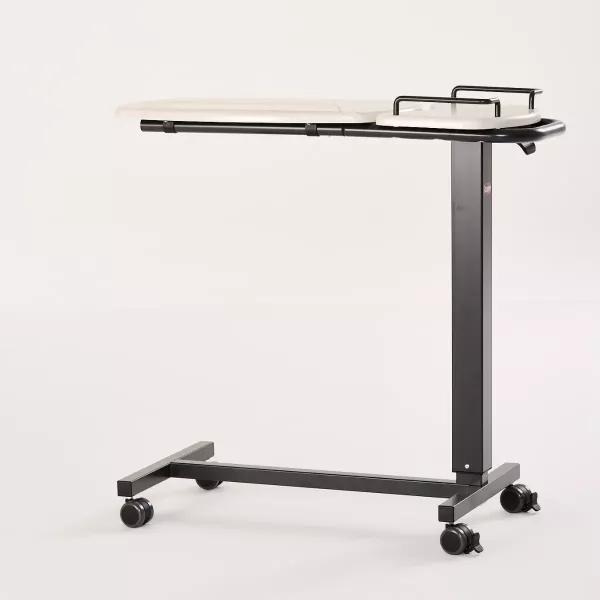 iCare Standard Over Bed Table in White Ash showing wheeled base and split tabletop